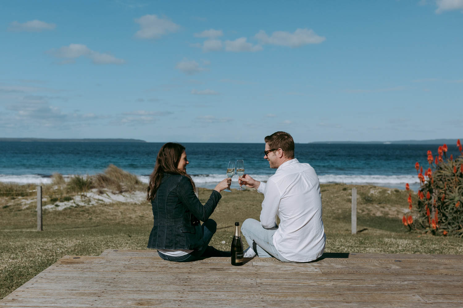 A couple enjoying luxury holiday rental accomodation NSW South Coast managed by Super Calla Private Properties